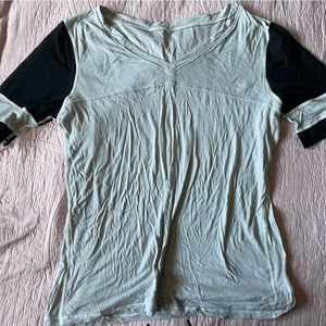 White Lululemon T-shirt with mesh sleeves